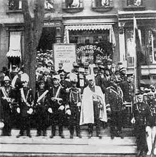 Marcus Garvey and other U.N.I.A. leaders in front of U.N.I.A. Publishing House in Harlem, NY